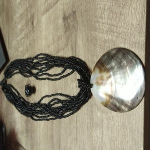 BOHO Oyster Faux Shell. 9 Strands Black Beaded Chain.